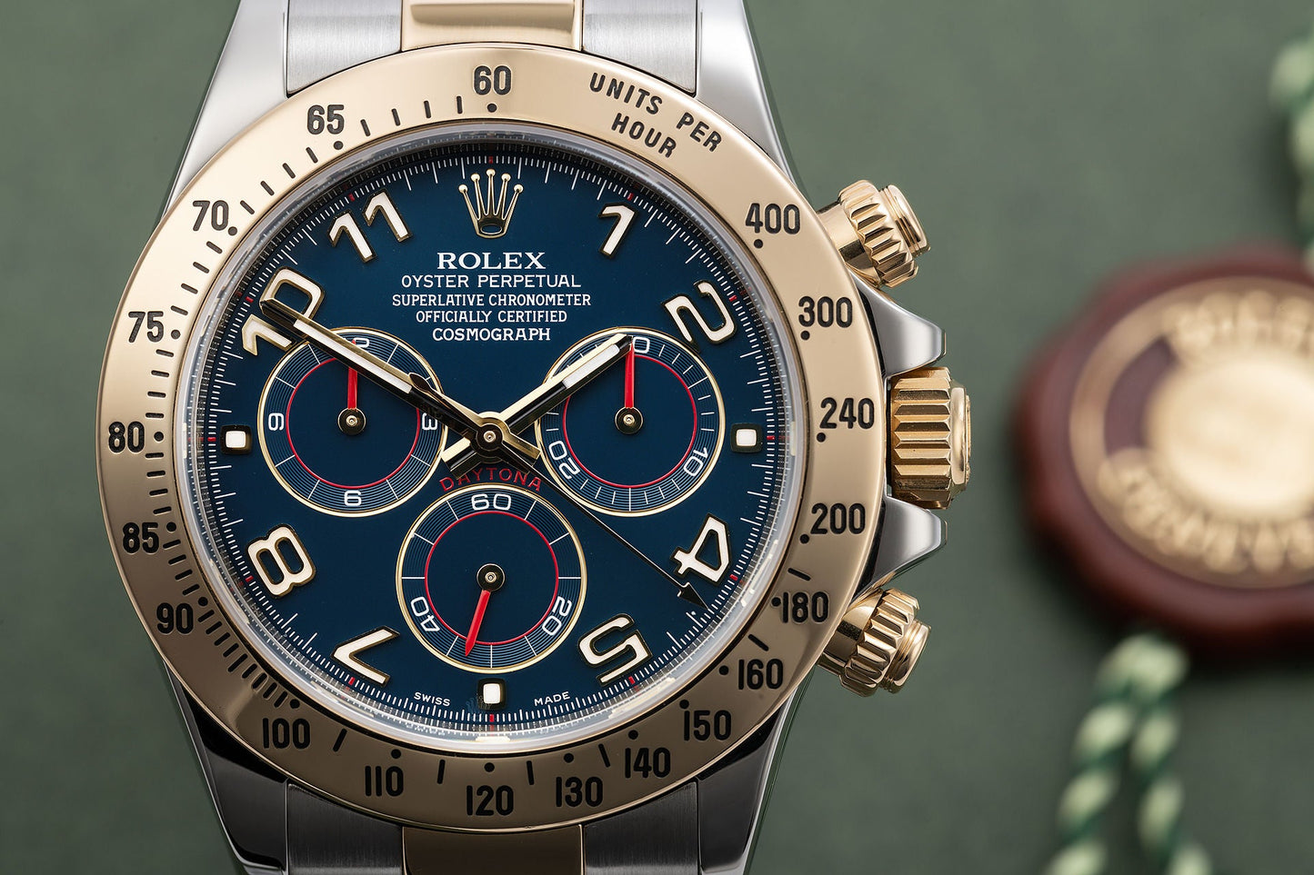 Daytona Steel Yellow Gold Blue Racing Dial Mens Watch 116523